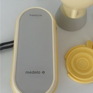 Medela Freestyle Pump in Soft Yellow and Gray